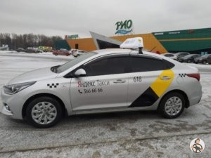 Ford Focus sedan брендирование Яндекс такси для Владимира