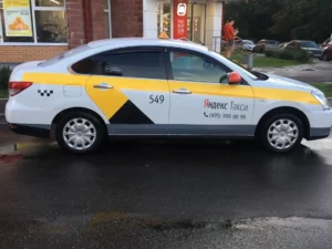 Nissan Almera брендирование Яндекс такси для Волгограда