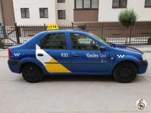 Renault Logan брендирование Яндекс такси для Челябинска